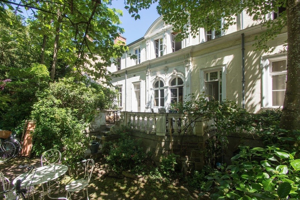 Maison divisée en plusieurs appartements (Est) – photo 2