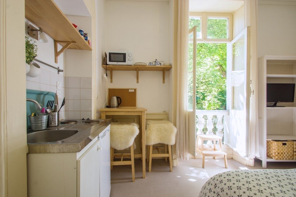 Maison divisée en plusieurs appartements (Est) – photo 4