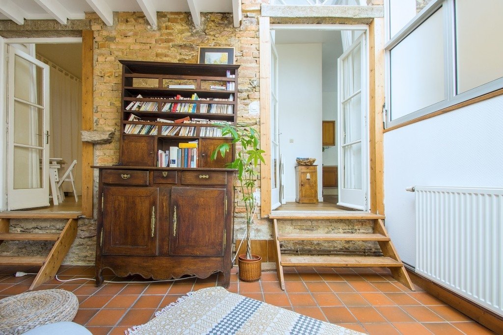 Maison divisée en plusieurs appartements (Est) – photo 8