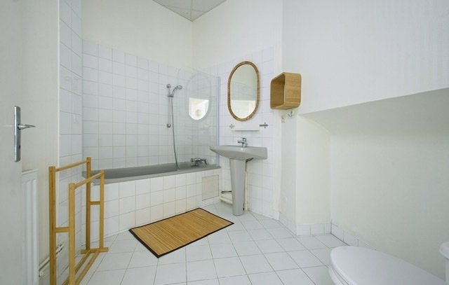 Maison divisée en plusieurs appartements (Est) – photo 17