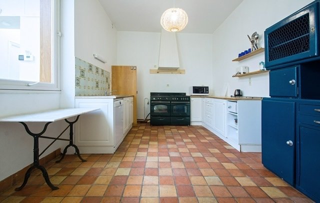 Maison divisée en plusieurs appartements (Est) – photo 19