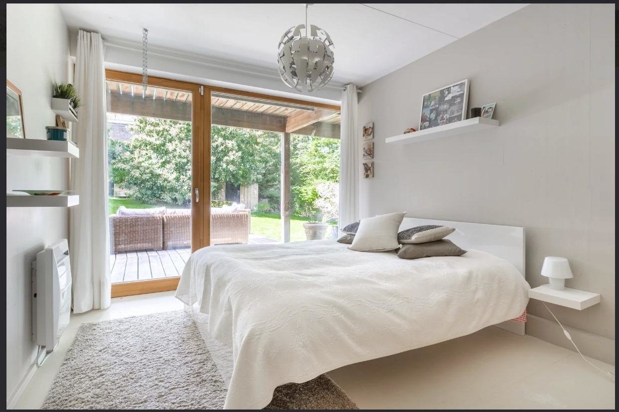 Maison en bois atypique dans un écrin de verdure proche de Paris – photo 11